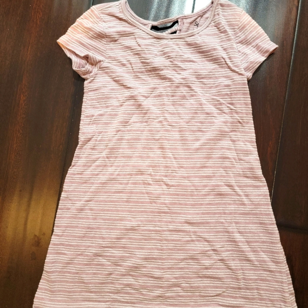 Pink and white textured dress.